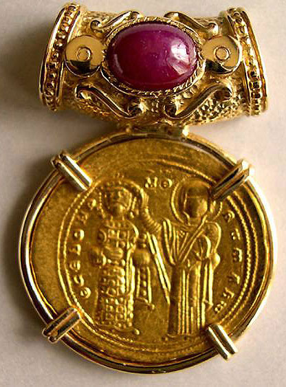 Byzantine Empire: Romanus III 1030-1060 AD. Gold Histamenon Nomisma set in a 14 K. Gold bezel with a red ruby
