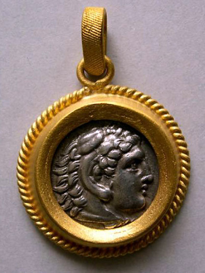 Kings of Macedon. Alexander III. 336-323 BC. AR Drachm set in a 24 k. pure gold custom made frame.